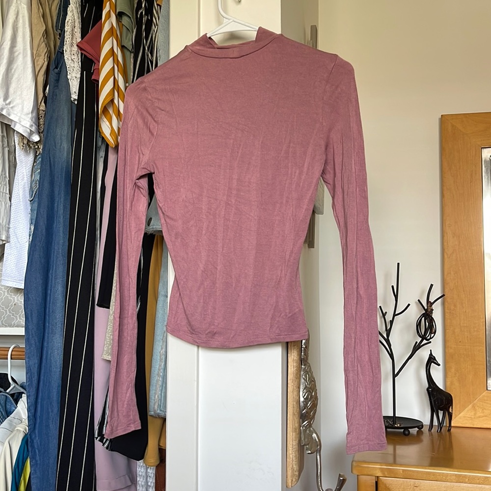 Tight pink long sleeve shirt from Garage!
